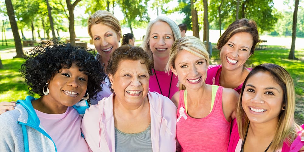 Smiling women that have gotten breast health services at Baptist Health